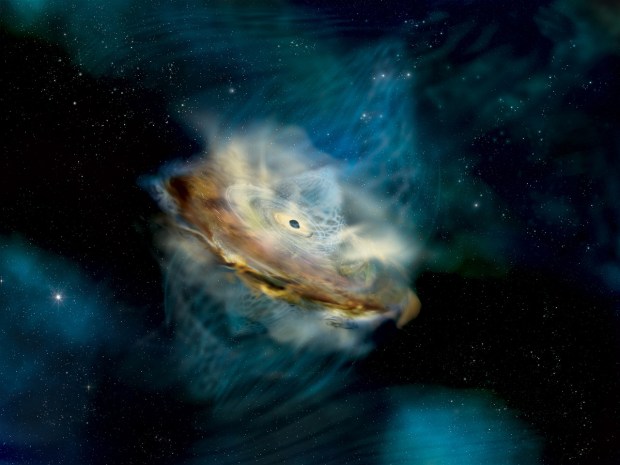 An illustration of a supermassive black hole and its accretion disk. Credit: NASA/Aurore Simonnet (Sonoma State Univ.)