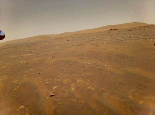 This image of Mars was taken from the height of 33 feet (10 meters) by NASA's Ingenuity Mars helicopter during its sixth flight, on May 22, 2021. Credit: NASA