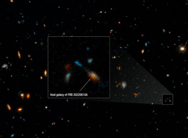 A Hubble Space Telescope image of the host galaxy of an exceptionally powerful fast radio burst, FRB 20220610A. Hubble’s sensitivity and sharpness reveals a compact group of multiple galaxies that may be in the process of merging. They existed when the universe was only 5 billion years old. Credit: NASA, ESA, STScI, Alexa Gordon (Northwestern)