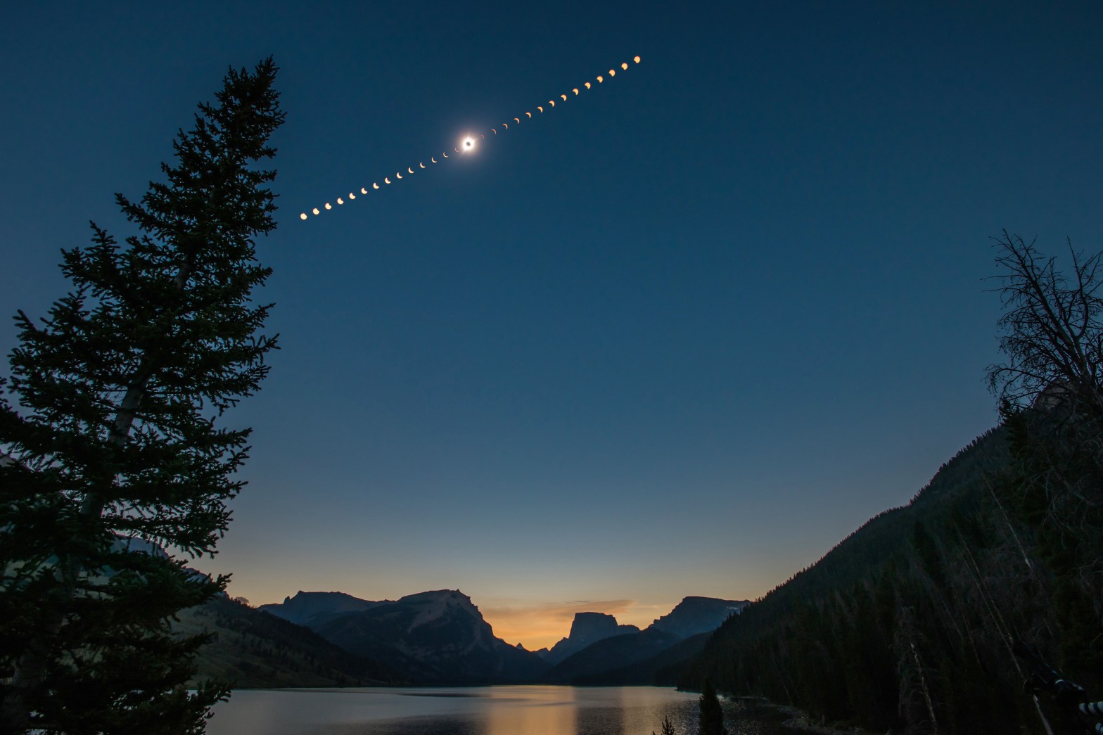 The Moon’s shadow falls on Green River Lakes, Wyoming, during the Aug. 21, 2017, solar eclipse in this composite image.