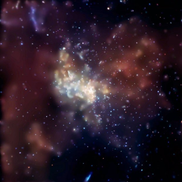 This image was collected over two weeks in 2003 by the Chandra X-Ray Observatory and shows astunning explosion occurring in the super massive black hole at the Milky Way's center, known as Sagittarius A or Sgr A*. Credit: NASA.