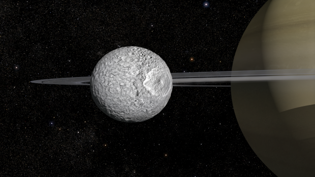 Saturn’s moon Mimas shows off its heavily cratered surface — including the large impact crater Herschel — in this rendering. Credit: Frédéric Durillon, Animea Studio | Observatoire de Paris – PSL, IMCCE