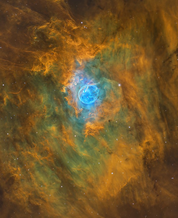 The Bubble Nebula (NGC 7635) in Cassiopeia appears in sharp detail in this Hα/OIII/RGB image with exposures of four, four, three, three, and three hours, respectively.