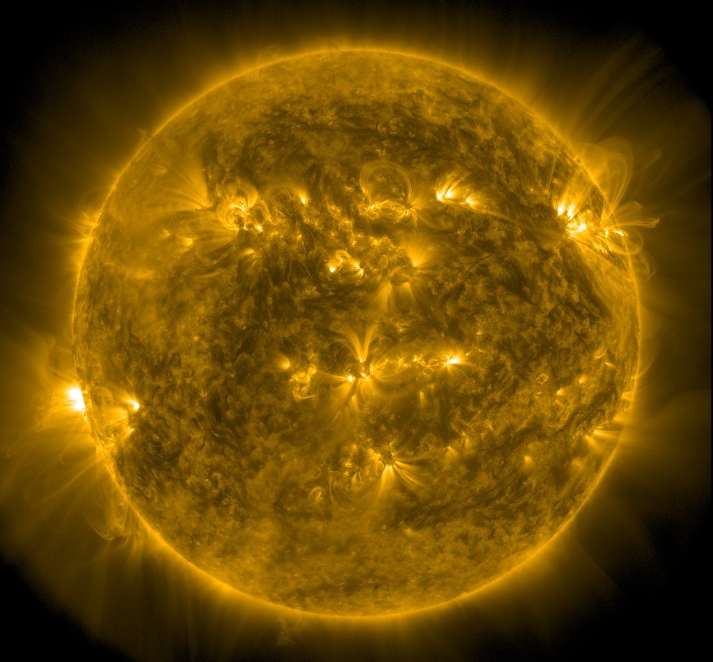 A photograph of the sun showing it blazing briilliantly.