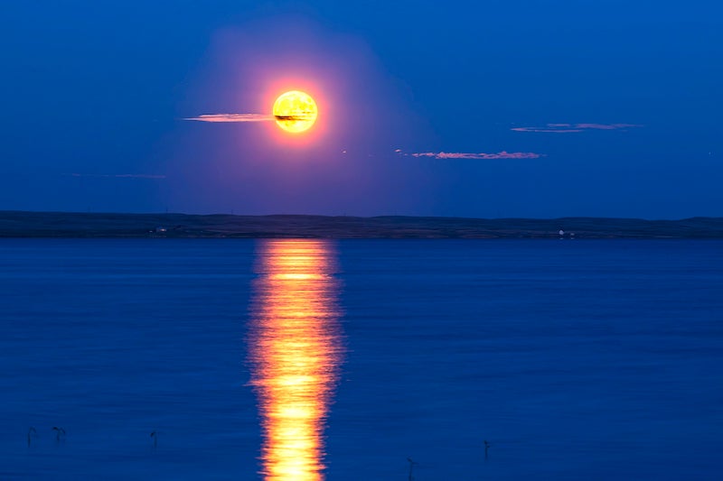 The Moon over McGregor Lake on June 24, 2021